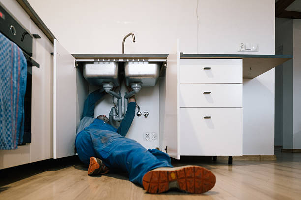 Professional Emergency Plumber technician working in Port Washington, NY